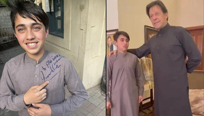 In this picture shared by PTI young Abu Bakar is showing his autographed shirt.