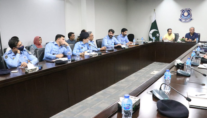 IG Islamabad Dr Akbar Nasir Khan chairs a meeting to review the security situation in the federal capital ahead of PTIs Azadi March. -ICT Twitter