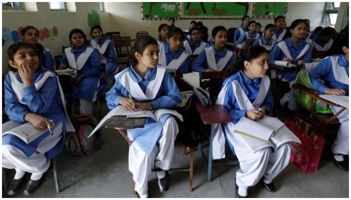 Students listen to their teacher during a lesson at the Islamabad College for girls in Islamabad, Pakistan.  -The News/file
