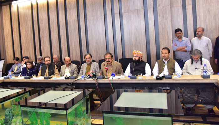 Federal Interior Minister Rana Sanaullah, along with government allies, addressing a press conference after the meeting of the federal cabinet in Islamabad on May 24, 2022. Photo: PID