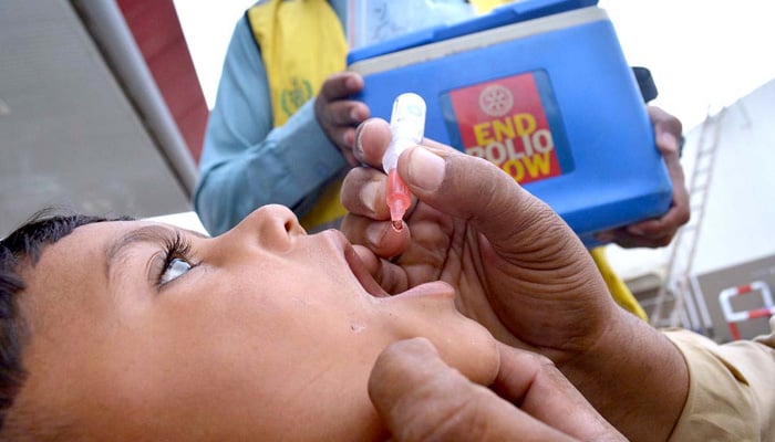 A health worker is administering Polio drops to children during a country-wide vaccination campaign. -APP/File
