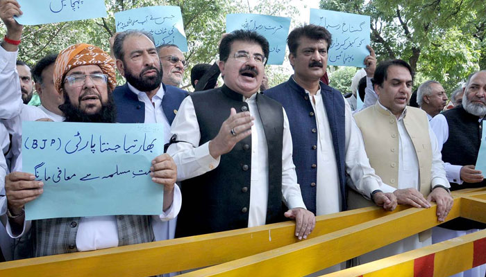 Chairman Senate Sadiq Sanjrani and other parliamentarians protesting over the highly derogatory remarks by senior official of Indias ruling party Bharatiya Janatha Party against the holy Prophet (peace be upon him) in front of the Indian embassy on June 10, 2022. Photo: APP