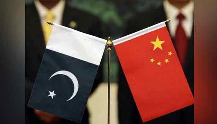 The flags of Pakistan and China can be seen in this file photo.