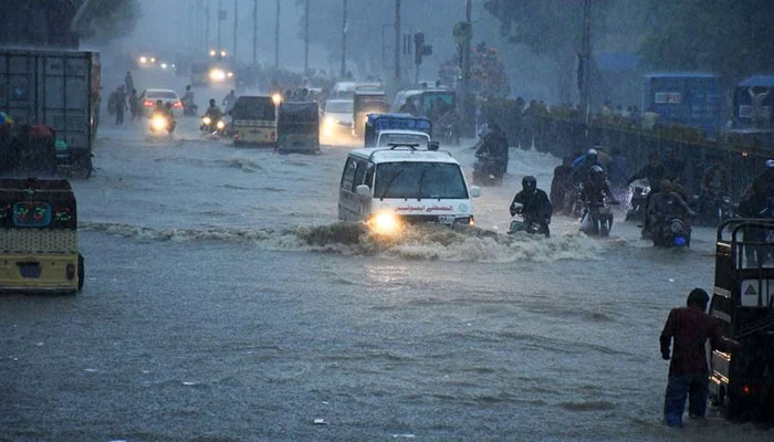 A flooded Karachi thoroughfare. &mdash; Photo courtesy Baseer Ahmed/Twitter