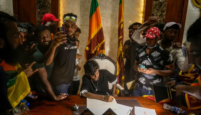 Protesters raid Sri Lanka PM&rsquo;s office after president flees abroad. Photo: Twitter