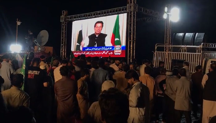 Imran Khan addressing the main thanksgiving function on a video link at the F-9 Park Islamabad on July 27, 2022. Photo: Screengrab of a Twitter video