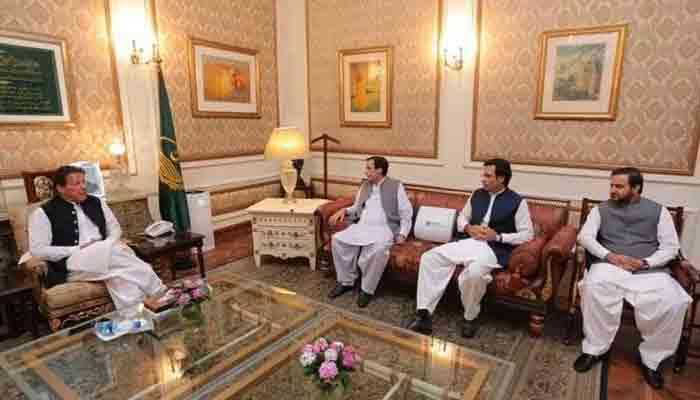 PTI Chairperson Imran Khan meets Punjab CM Pervez Elahi during Lahore visit.