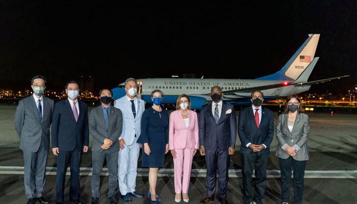 Pelosi lands in Taiwan as China puts military on high alert