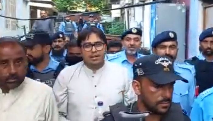 PTI leader Shahbaz Gill being taken to a court in Islamabad, on August 10, 2022. &mdash; Photo Mughees Ali/ Twitter