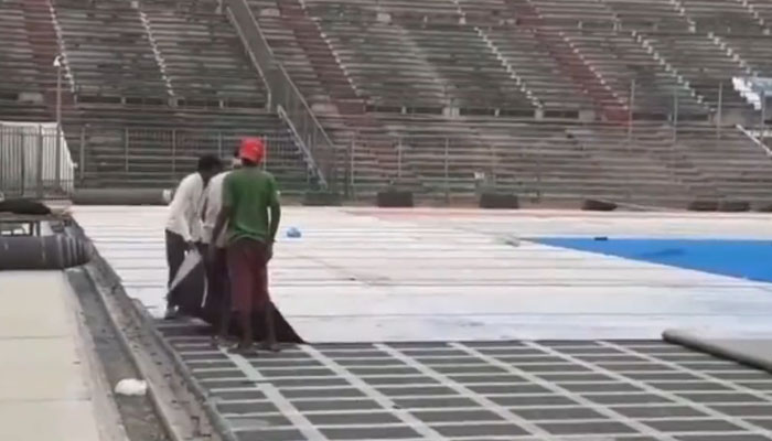 Lahore Hockey Stadiums turf being removed. — Twitter/Muzamil Asif