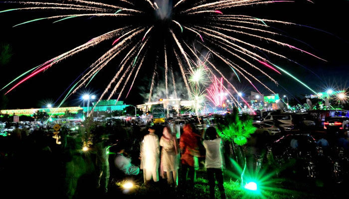 An eye-catching view of fireworks on the eve of Pakistans 75th Independence Day in front of the Parliament House, Islamabad on August 13, 2022. Photo: