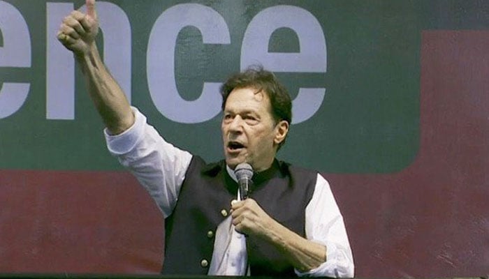 Imran Khan addressing a public rally at Lahores National Hockey Stadium on August 13, 2022.