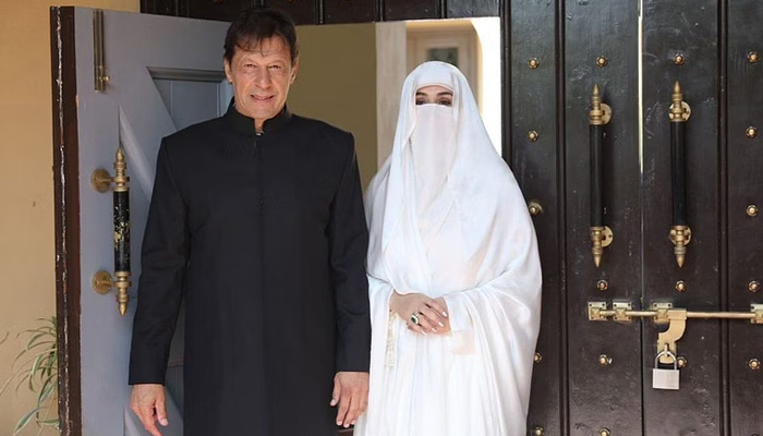 Former prime minister Imran Khan and his wife Bushra Bibi. Courtesy PTI Twitter
