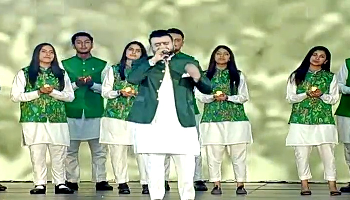 Singer Sahir Ali Bagga performing on stage during a ceremony to mark the diamond jubilee in Islamabad. -Screengrab PTV News