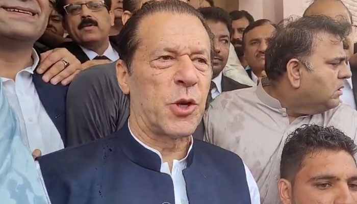 Former prime minister Imran Khan, who is facing terrorism charges, speaking to media after appearing in court to extend pre-arrest bail, in Islamabad. — PTI Twitter