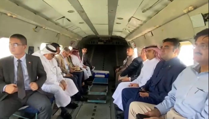 Foreign Minister Bilawal Bhutto Zardari and CM Sindh Murad Ali Shah accompanied by diplomats during aerial view of the flood ravaged areas. —PPP Twitter