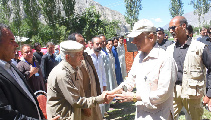 Prime Minister Shehbaz Sharif meeting flood victims in GB. &mdash;PID