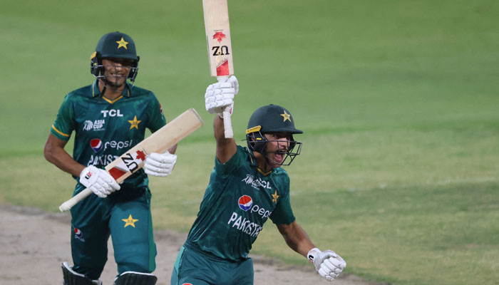 Pakistan´s Naseem Shah (R) celebrates after hitting a boundary to win the Asia Cup Twenty20 international cricket Super Four match between Afghanistan and Pakistan at the Sharjah Cricket Stadium. — AFP/ KARIM SAHIB