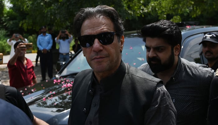 Former Pakistani prime minister Imran Khan (C) arrives to appear before the Anti-Terrorism Court in Islamabad on September 1, 2022. —AFP