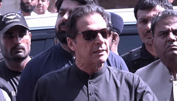 Ex-PM Imran Khan talking to media as he appears before the JIT. Twitter