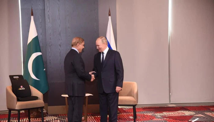 Russian President Vladimir Putin (right) meets Pakistani Prime Minister Shehbaz Sharif on the sidelines of the Shanghai Cooperation Organisation (SCO) summit in Samarkand, Uzbekistan, on September 15, 2022. PM Office
