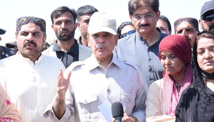 PM Shehbaz talking to media at a tent city in the Jakhro village. PID