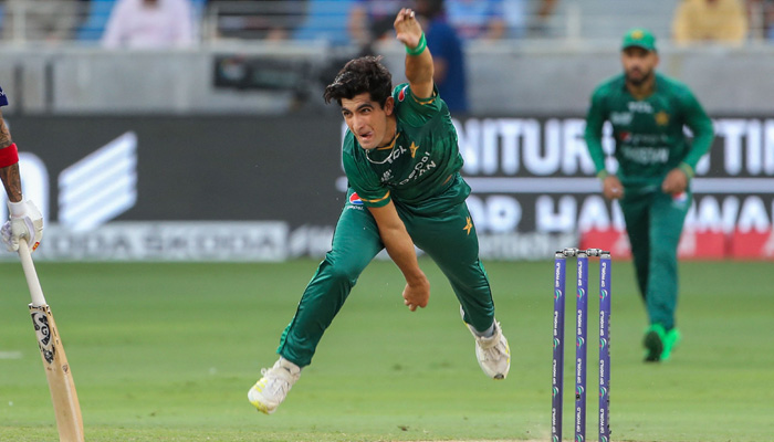Pakistans Naseem Shah delivers a ball during the Asia Cup Twenty20 international cricket Super Four match between India and Pakistan at the Dubai International Cricket Stadium in Dubai on September 4, 2022. —AFP