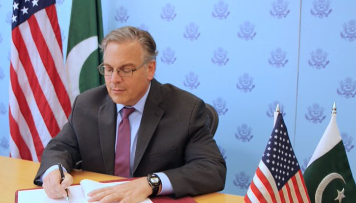 US Ambassador Blome signing second US Pakistan bilateral agreement under G20 Debt Service Suspension Initiative. —US Embassy