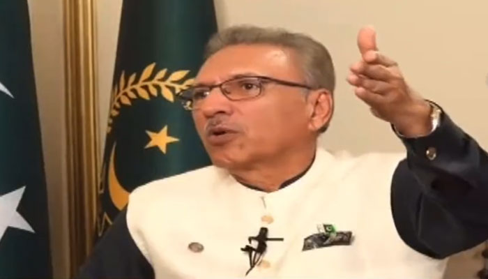 President Arif Alvi speaking to a private news channel in an exclusive interview on October 10, 2022. Screengrab of a Twitter video