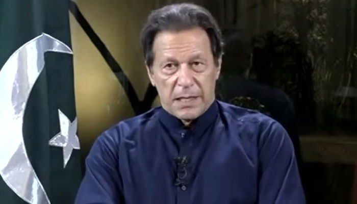 Imran Khan addressing the long march participants via video link on November 15, 2022. Screengrab of a Twitter video.