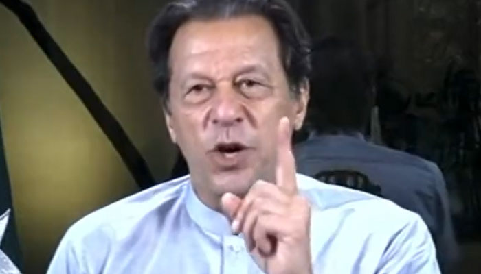 Imran Khan addressing the long march via video link. Screengrab of a Twitter video.