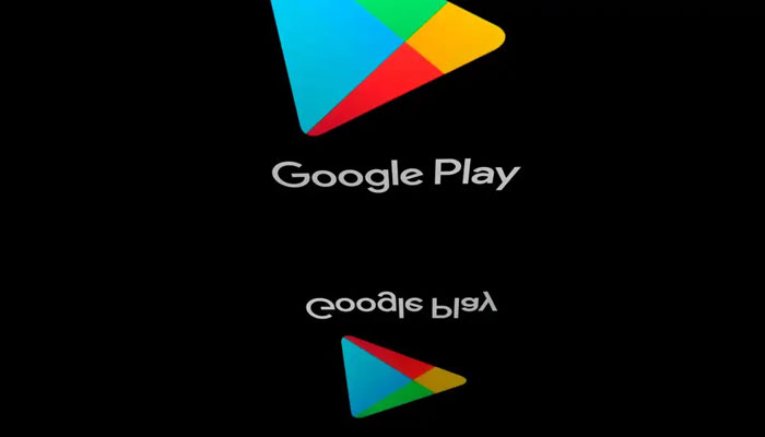 GooglePlay icon and its inverted reflection seen in this representational image. — AFP?File