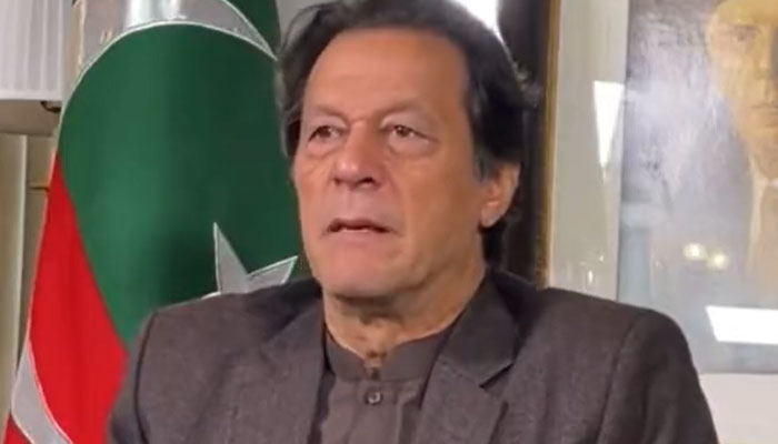 Imran Khan addressing his partys MPAs in Peshawar through a video link from Lahore. Screengrab of a Twitter video.
