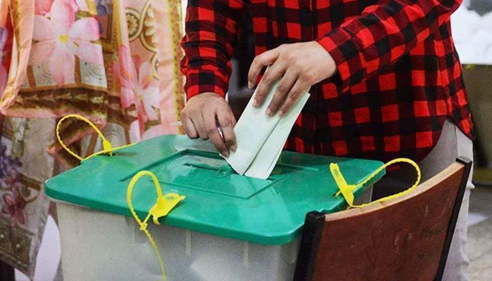 A representational image shows a man casting his vote during an election in Pakistan. — AFP/File