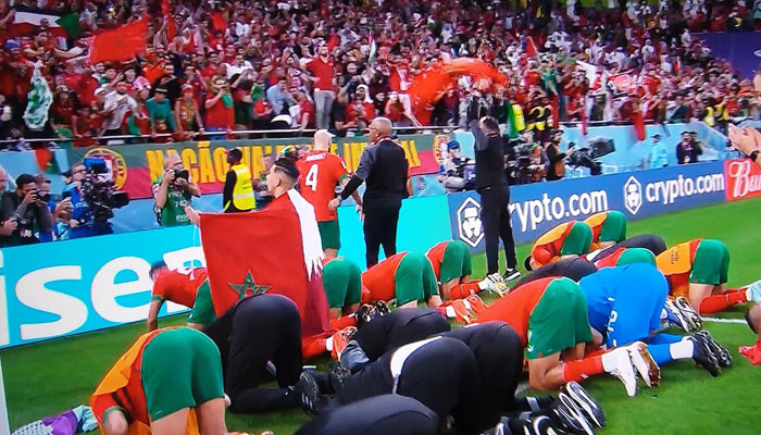 Morocco team celebrates their win vs Portugal. Twitter