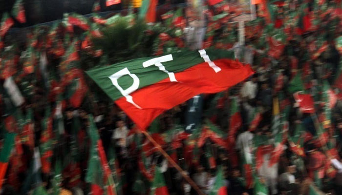 A representational image of a PTI flag waving during the partys rally. — AFP/File