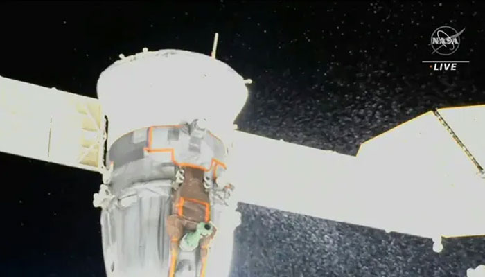 Video grab from a Nasa feed showing liquid spraying from the aft end of the Soyuz MS-22 spacecraft. Photograph: Nasa/AFP