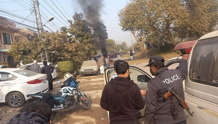 People gathered after a suicide car bomb blast in I-10 sector, Islamabad. Twitter