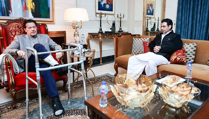 PML-Q leader Moonis Elahi meets PTI chief Imran Khan on December 20, 2022. Twitter/MoonisElahi6