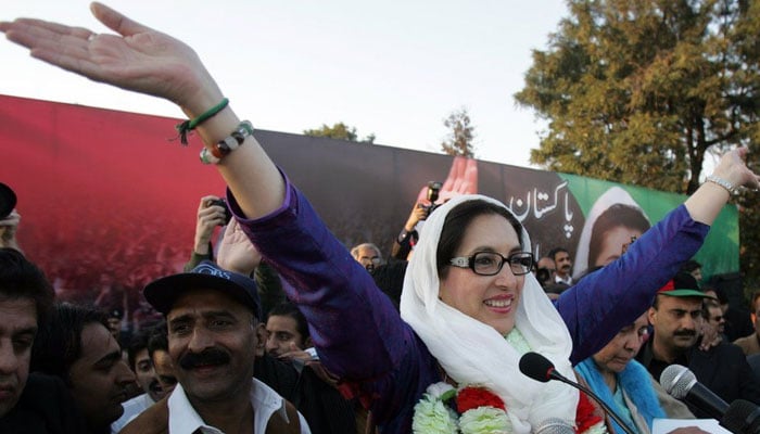 Benazir Bhutto at the election campaign rally where she was killed. — AFP/File
