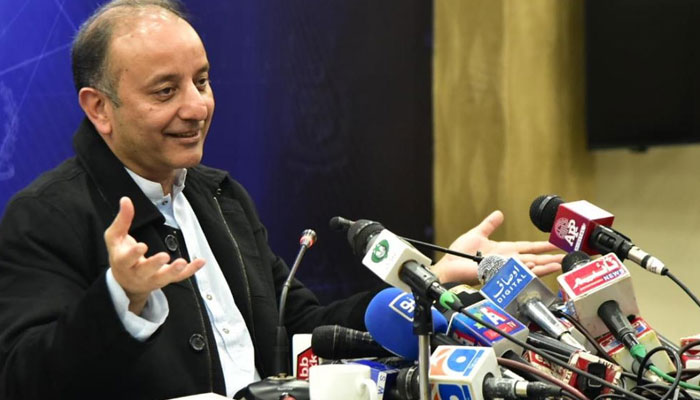 State Minister for Petroleum Dr Musadik Malik addressign a press conference in Islamabad on December 5, 2022, PID