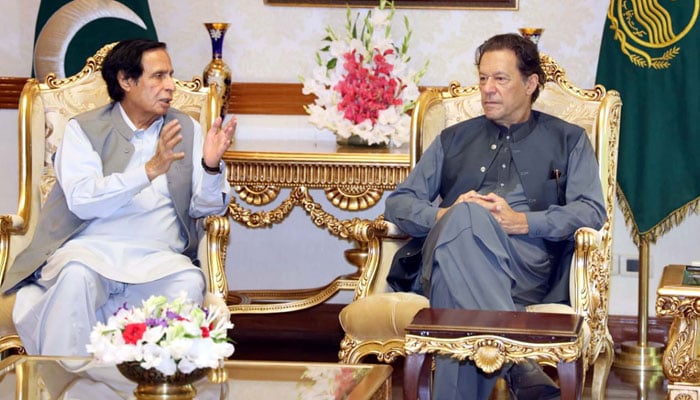 Punjab Chief Minister Chaudhry Parvez Elahi exchanging views with Pakistan Tehreek-e-Insaf Chairman Imran Khan during a meeting held at CM Office in Lahore on September 26, 2022. — PPI