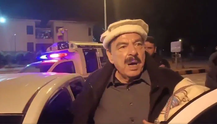 Sheikh Rashid talking to the newsmen after being arrested by Islamabad police in pre-dawn raid on his residence on February 2, 2023. Screengrab of a Twitter video.