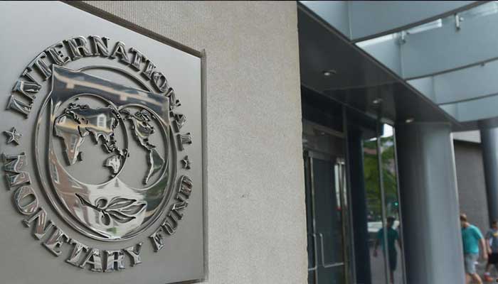 The IMF logo is seen on a wall of the building of the Funds headquarters. — AFP/File
