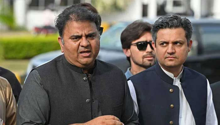 PTI Senior Vice President Fawad Chaudhry and former minister Hammad Azhar pictured during a media talk in Islamabad. — AFP/File