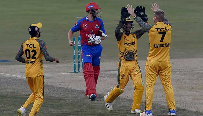 Peshawar Zalmi´s Liam Livingstone (R) celebrates the wicket of Karachi Kings´ Joe Clarke (2L) during the Pakistan Super League (PSL) Twenty20 cricket match between Karachi Kings and Peshawar Zalmi at the Gaddafi Cricket Stadium in Lahore on February 13, 2022. — AFP/File