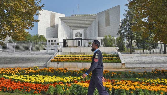 A policeman walks past the Supreme Court building in Islamabad, Pakistan in this undated photo. — AFP/File