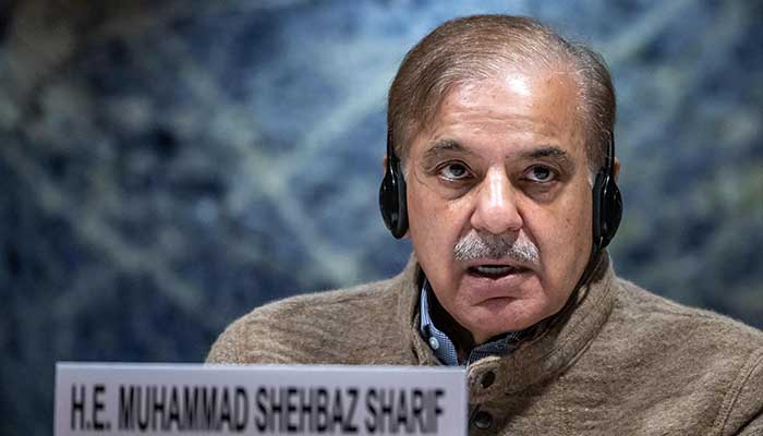 PM Shehbaz Sharif delivers a speech at the start of a Pakistan´s Resilience to Climate Change conference in Geneva on January 9, 2023. — AFP