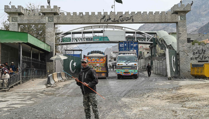 In this picture taken on February 2, 2023, a Pakistan border policeman is pictured from the zero point Torkham border crossing between Afghanistan and Pakistan, in Nangarhar province. —AFP