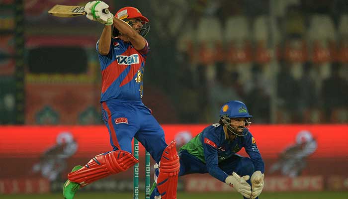 Karachi Kings´ captain Imad Wasim (L) plays a shot as Multan Sultans´ catapin wicketkeeper Mohammad Rizwan watches during the Pakistan Super League (PSL) T20 cricket match between Karachi Kings and Multan Sultans at the Multan Cricket Stadium in Multan on February 22, 2023. — AFP/File